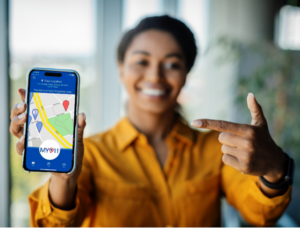 woman holding phone e1737979155295